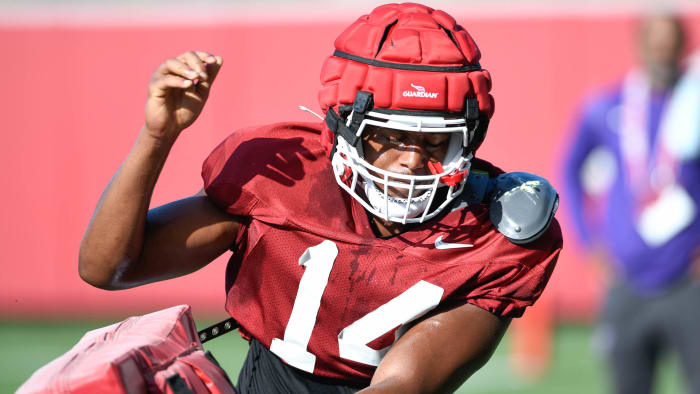 Razorbacks defensive lineman Jordan Domineck at practice Tuesday morning on the outdoor grass practice fields at the football center in Fayetteville.